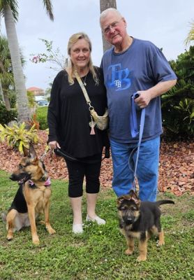 1565
PUPPY ROLO WITH NEW MOM PEGGY AND DAD MIKE
