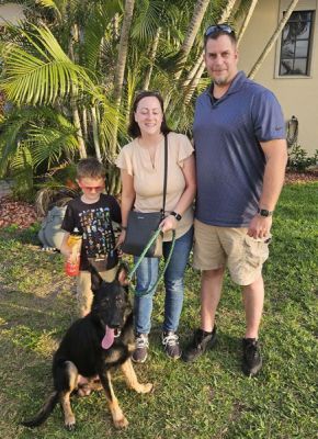 1583
SHADOW WITH NEW MOM AMANDA DAD DOUG AND NEW BEST FRIEND WYATT DOG 1583
