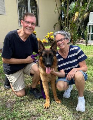 1497
RICKY WITH NEW MOM CAROLE AND DAD BRUCE DOG 1497
