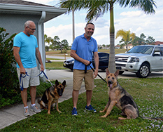 GATOR WITH FOSTERS LORIN AND BILL AND GIA TWO GREAT GUYS WHO HELPED GATOR HEAL AND BECOME A GREAT DOG. THANK YOU BOTH!! 
