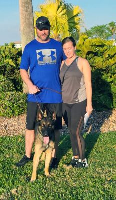 DOZER WITH NEW MOM BRIANA AND DAD MATT DOG 1341
Keywords: 1341