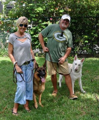 KATO WITH NEW MOM LESLIE AND DAD BRIAN AND BROTHER JAKE DOG 1170
Keywords: 1170