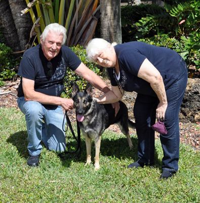 PUMA WITH NEW MOM LORETTA AND DAD CHARLIE DOG 1204
Keywords: 1204