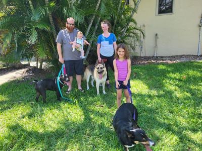 ZEUS2 WITH NEW MOM LAURA AND DAD BEN DOG 1339
Keywords: 1339