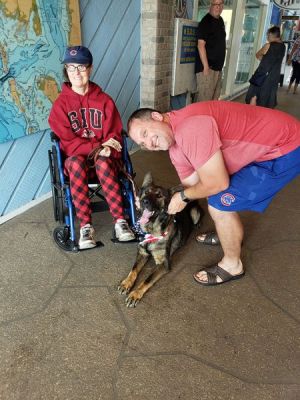 RANGER WITH NEW MOM AMY AND DAD TODD DOG 912
Keywords: 912