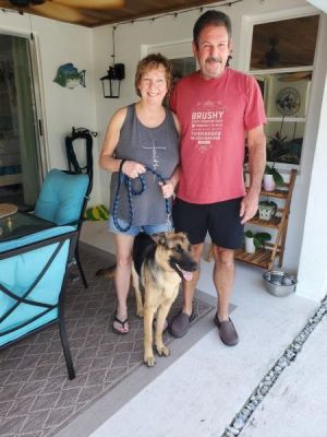 LUNA 3 WITH NEW MOM CINDY AND DAD MARK DOG 1256
Keywords: 1253