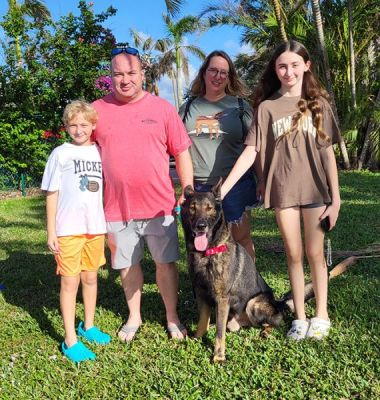 CHARLIE WITH NEW DAD TOM MOM SHANNON AND LAUREN AND JACKSON DOG 1409
Keywords: 1409