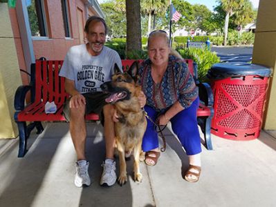 SAM WITH MOM BECKY AND DAD TOM  DOG 852
