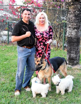 WINSTON WITH NEW MOM LISA AND DAD SCOTT WITH FOO FOO BROS DOG 772
