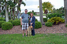 RUSTY WITH NEW DAD JIM AND MOM QUINCY DOG 575
